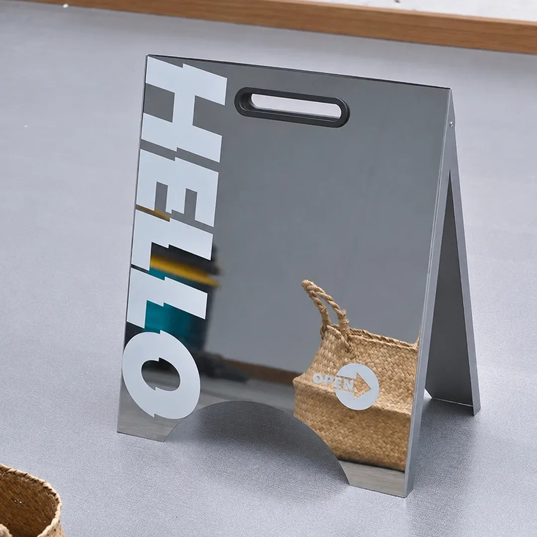 Mirror sign_with handle x with feet